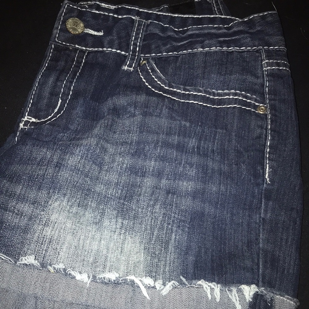 Mid rise jean shorts.